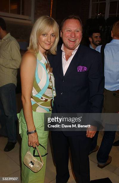 Garry Farrow and a guest attend Dylan Jones Book Launch Party of "iPod, Therefore I am'" at Asprey on July 14, 2005 in London, England.
