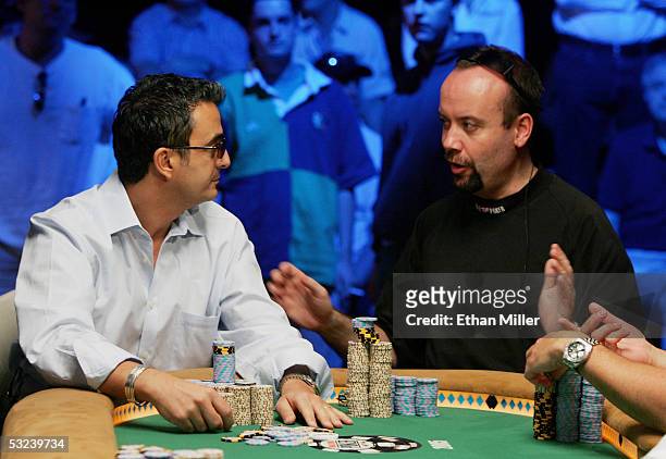 Joseph Hachem of Australia and Andrew Black of Ireland talk as they compete in the sixth round of the World Series of Poker no-limit Texas Hold 'em...