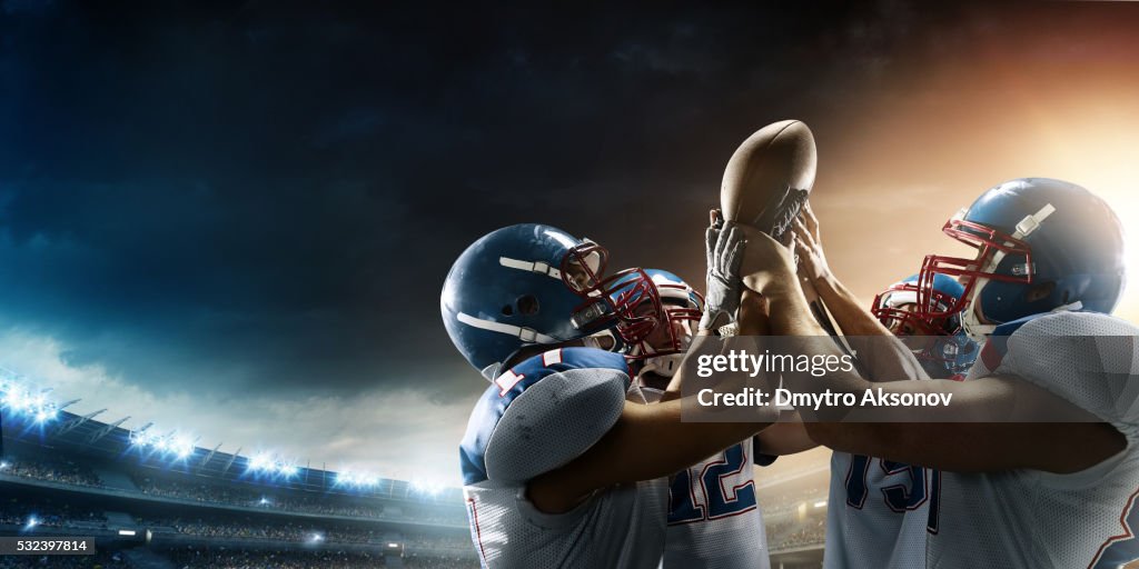 Football Players celebrate their victory