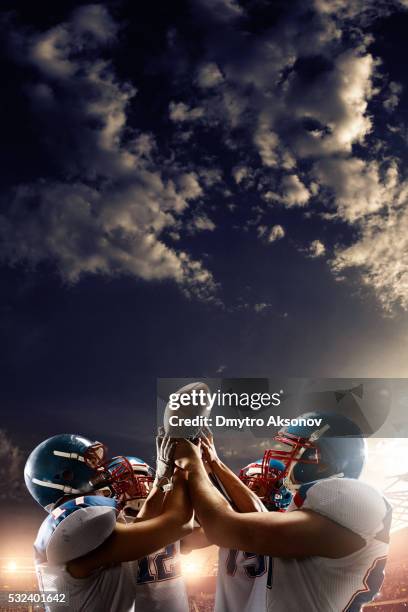 football players celebrate their victory - american football player celebrating stock pictures, royalty-free photos & images