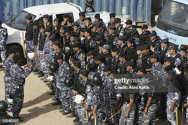 Al-BALAH - GAZA STRIP Palestinian policemen gather at their post in the Deir Al-Balah refugee camp, in an effort to prevent further rocket attacks on...