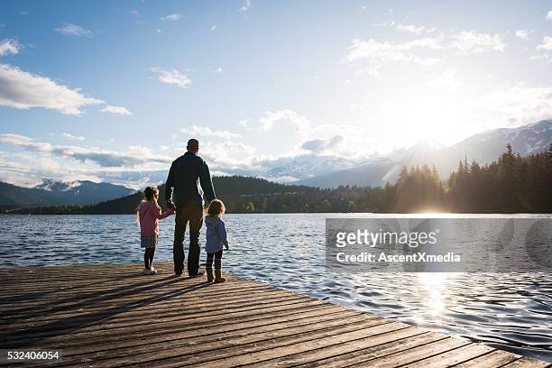 father and daughter connection - lake stock pictures, royalty-free photos & images