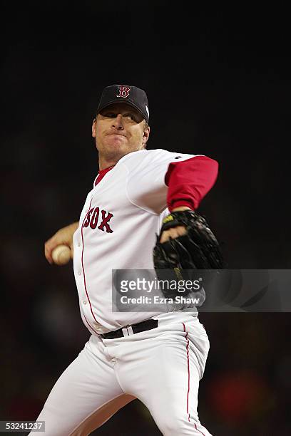 Curt Schilling of the Boston Red Sox pitches against the St. Louis Cardinals during game two of the 2004 World Series on October 24, 2004 at Fenway...