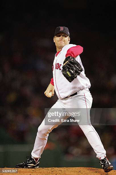 Curt Schilling of the Boston Red Sox pitches against the St. Louis Cardinals during game two of the 2004 World Series on October 24, 2004 at Fenway...