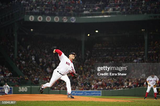 Curt Schilling of the Boston Red Sox pitches against the St. Louis Cardinals during game two of the 2004 World Series on October 24, 2004 at Fenway...