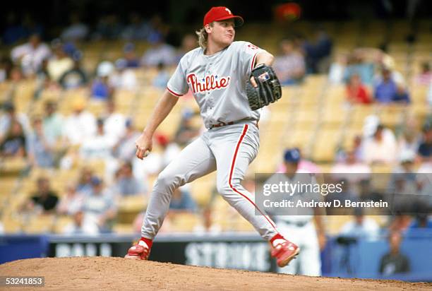 Curt Schilling of the Philadelphia Phillies delivers the ball during a season game on July 3, 1992. Curt Schilling played for the Philadelphia...