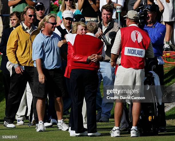 Jack Nicklaus of the USA embraces his wife Barbara at the completion of his round at what could be his last British Open during the second round of...