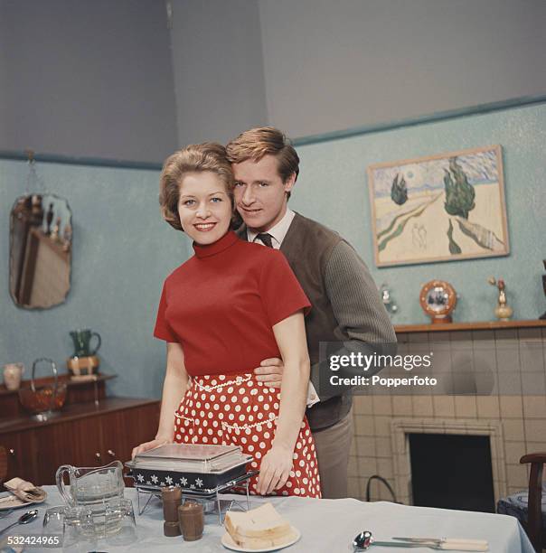 Actors William Roache and Anne Reid posed together in character as Ken Barlow and Valerie Barlow on the set of the television soap opera Coronation...