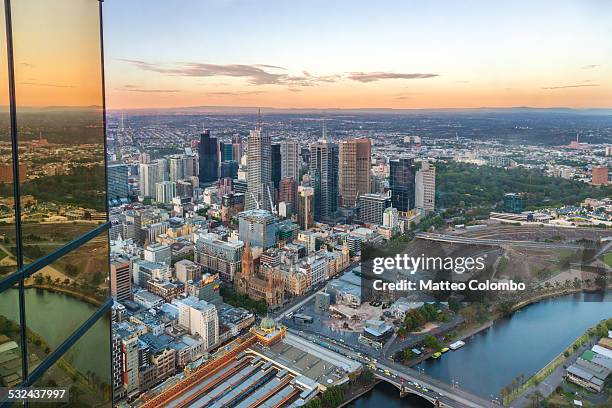 aerial of melbourne city at sunset, australia - federation square melbourne stock-fotos und bilder