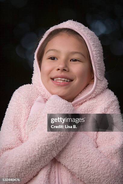 little girl in pink hoodie - frottee stock-fotos und bilder
