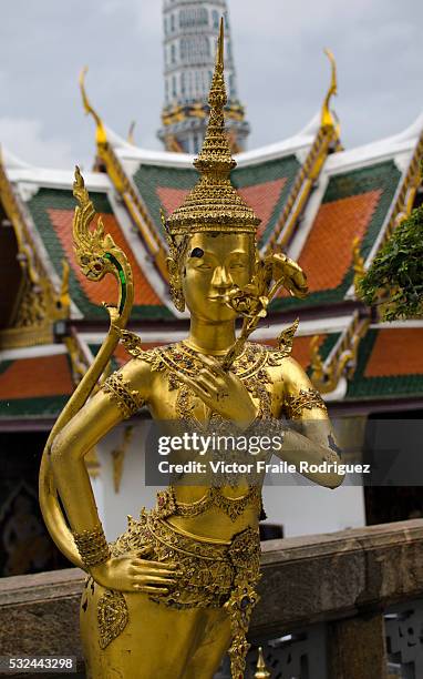 Bangkok, Thailand --- Statue of a kinnara in the Wat Phra Kaew Temple of the Emerald Buddha in Bangkok. Photo by Victor Fraile --- Image by © Victor...