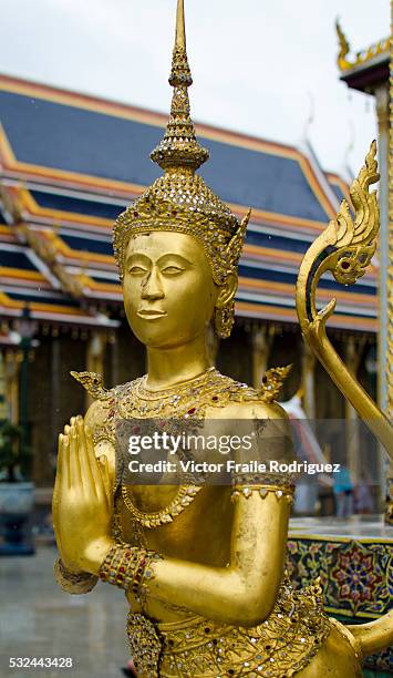 Bangkok, Thailand --- Statue of a kinnara in the Wat Phra Kaew Temple of the Emerald Buddha in Bangkok. Photo by Victor Fraile --- Image by © Victor...