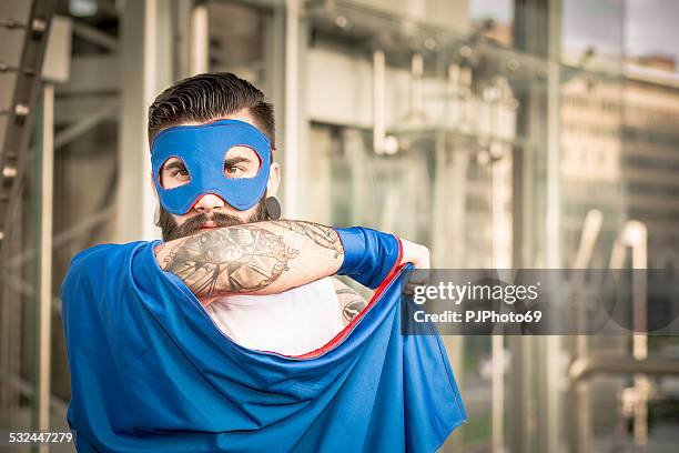 hipster superhero in action - cosplayer stock pictures, royalty-free photos & images