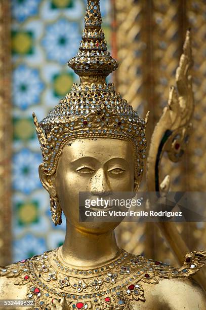 Bangkok, Thailand --- Statue of a kinnara in the Wat Phra Kaew Temple of the Emerald Buddha in Bangkok. Photo by Victor Fraile --- Image by © Victor...