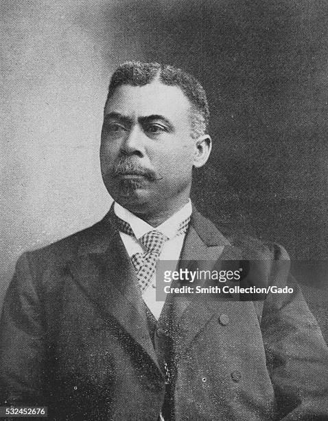 Black and white portrait of Judson W Lyons, a graduate of Howard University law, who became the first African-American attorney in Georgia, 1902....