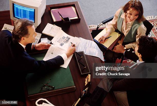 meeting - business man sitting banking imagens e fotografias de stock