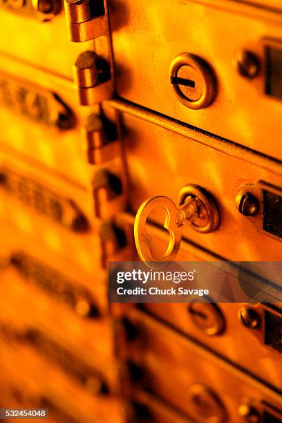 safe deposit boxes and key - safe deposit box stock pictures, royalty-free photos & images