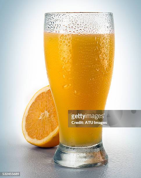 orange juice in glass - orange juice stock pictures, royalty-free photos & images