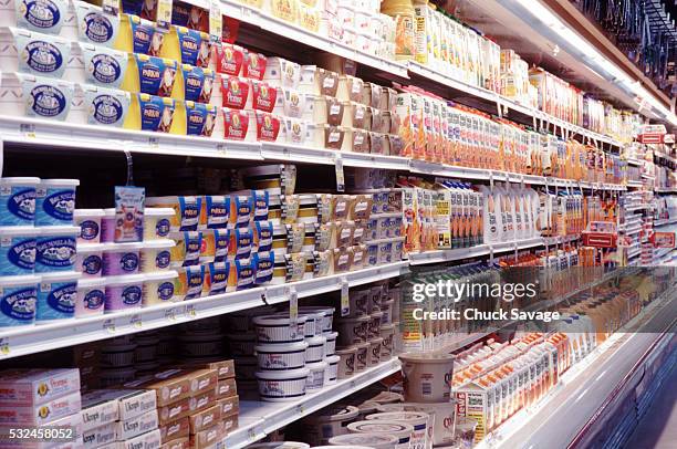 butter and orange juice - dairy aisle stock pictures, royalty-free photos & images