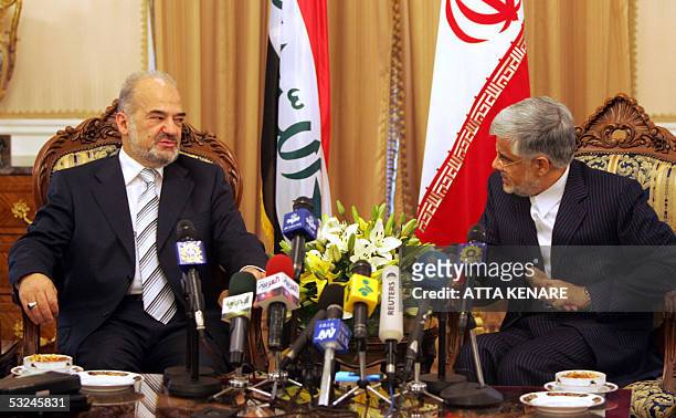 Iranian Vice-President Mohammad Reza Aref meets with Iraqi Prime Minister Ibrahim Jaafari at the Saadabad palace in Tehran 16 July 2005. Jaafari...