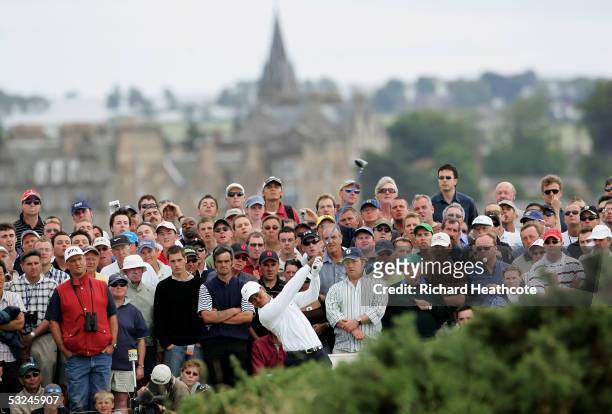 Tiger Woods of the USA hits his tee shot on the fifth hole during the third round of the 134th Open Championship at Old Course, St Andrews Golf...