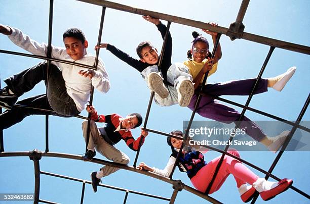 kids playing on a jungle gym - girls shoes - fotografias e filmes do acervo