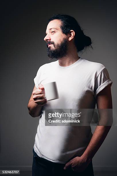 hipster guy enjoying a cup of coffee - blank t shirt model stock pictures, royalty-free photos & images