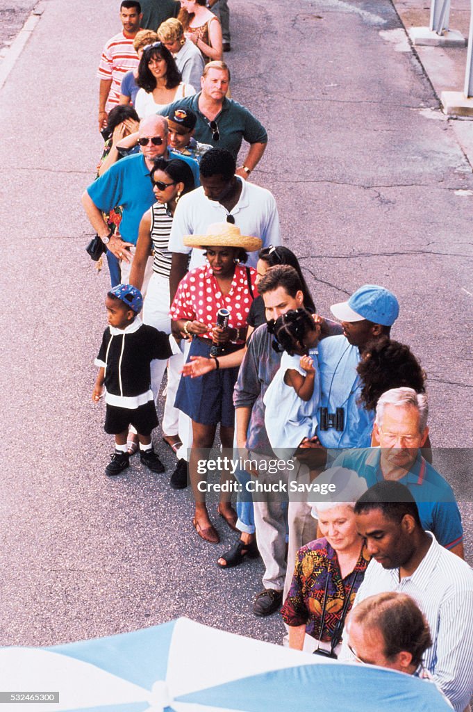 People standing in line at a stadium