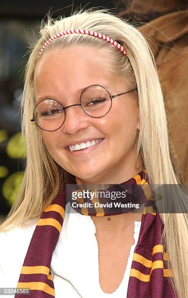 Actress/singer Jennifer Ellison helps promote free copies of JK Rowling's latest installment "Harry Potter And The Half-Blood Prince," released...