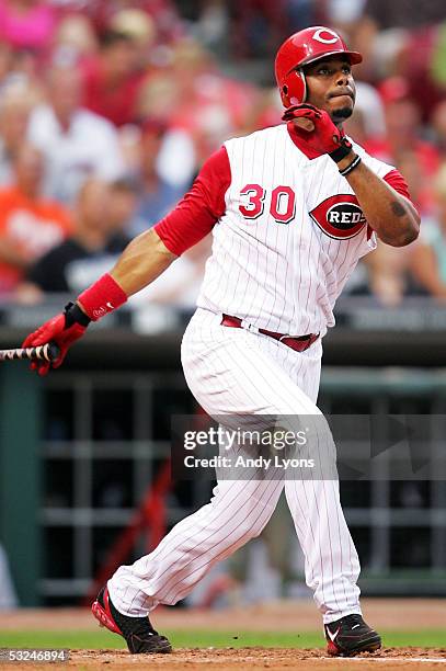 Ken Griffey Jr. #30 of the Cincinnati Reds hits a 4th inning home off of Jeff Francis of the Colorado Rockies on July 16, 2005 at Great American...