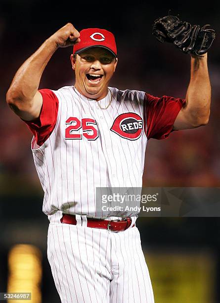 David Weathers of the Cincinnati Reds celebrates after the final out and the Reds defeated the Colorado Rockies 7-6 on July 16, 2005 at Great...