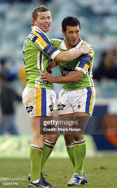 Todd Carney and Lincoln Withers of the Raiders celebrate victory after the round 19 NRL match between the Canberra Raiders and the Parramatta Eels...