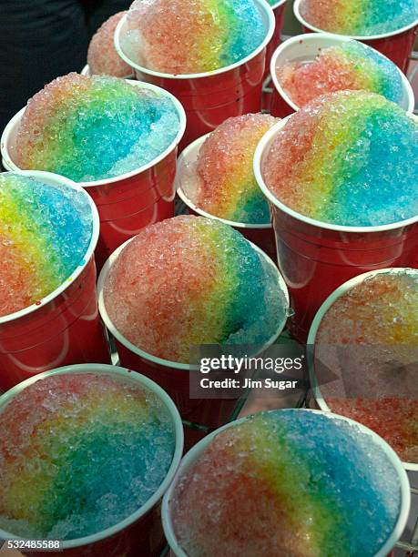 Rainbow snow cones wait to be purchased during a spring training between the Chicago Cubs and Los Angeles Angels.