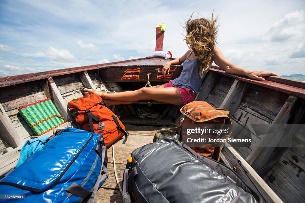 A woman on a boat adventure.