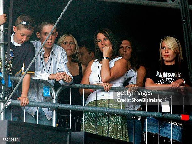 Nicole Appleton watches Oasis performs on stage in Marley Park on June 16, 2005 in Dublin, Ireland.