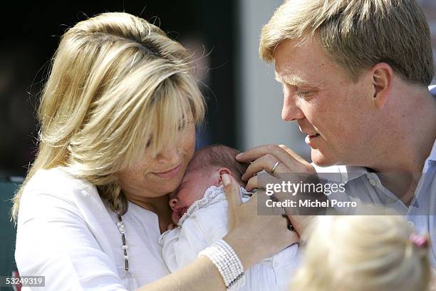 Dutch Princess Maxima holds her newborn daughter Alexia as she poses with husband Prince Willem-Alexander for a photocall at their home De Horsten on...