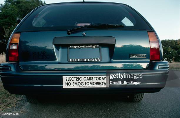 back end of electric car - bumper sticker stock pictures, royalty-free photos & images