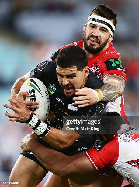 Cody Walker of the Rabbitohs is tackled during the round 11 NRL match between the South Sydney Rabbitohs and the St George Illawarra Dragons at ANZ...