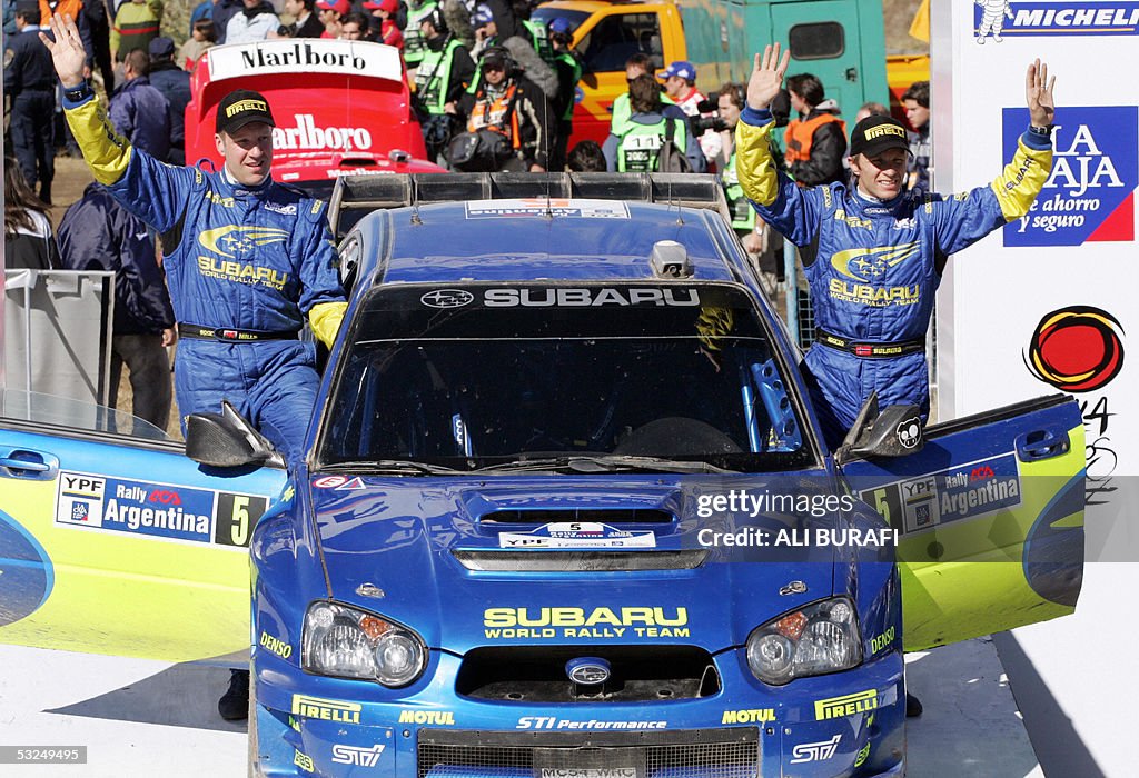 Norway's Petter Solberg (R) and Phil Mil