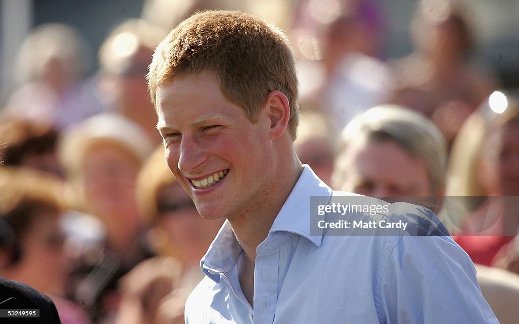 Prince Harry Plays Polo At Cirencester