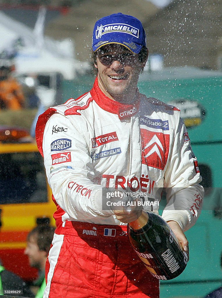French Sebastien Loeb celebrates on the