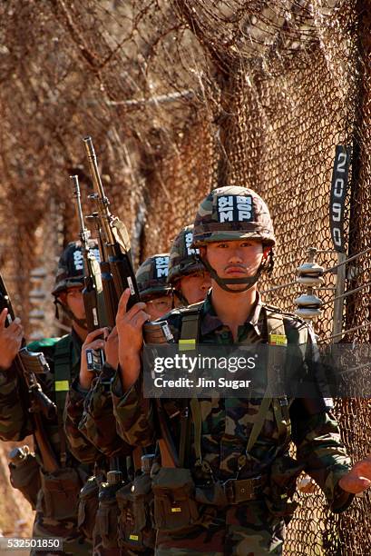 guarding dmz fence - south korean army stock pictures, royalty-free photos & images