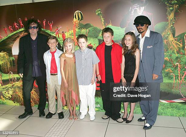 Director Tim Burton, actors Jordan Fry, Annasophia Robb, Freddie Highmore, Phillip Wiegratz, Julia Winter and Johnny Depp arrive at the UK Premiere...