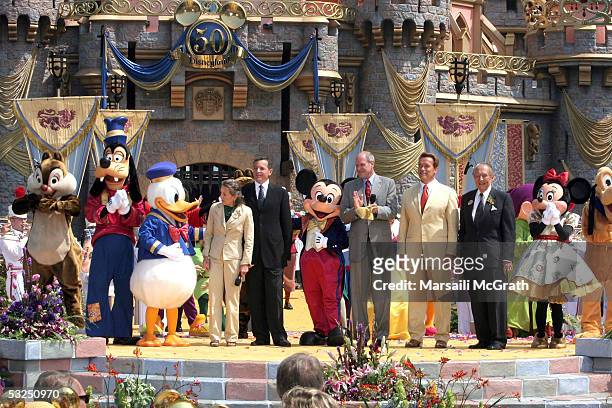 Diane Disney Miller, daughter of Walt Disney, Robert Iger, CEO-elect and president of The Walt Disney Company, Michael Eisner Chief executive officer...