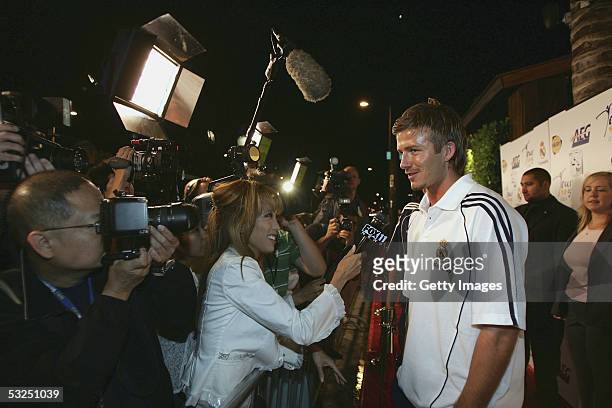 Soccer star David Beckham of Real Madrid addresses the media at a Real Madrid reception presented by AEG on the eve of their match against the Los...