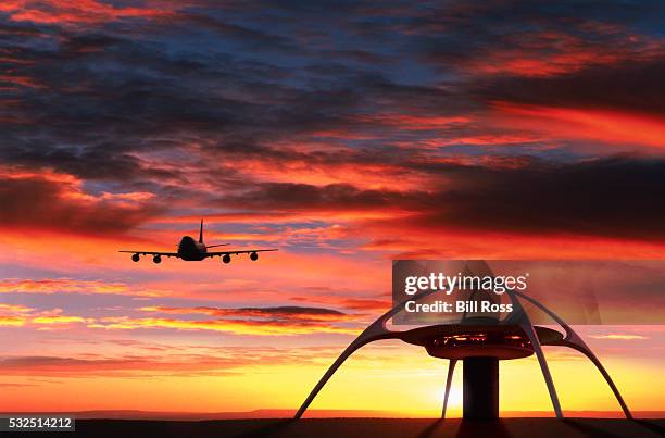 jet arriving at los angeles international airport - lax airport stock pictures, royalty-free photos & images
