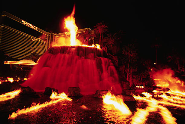 fake volcano and flames at the mirage hotel - mirage las vegas stock pictures, royalty-free photos & images