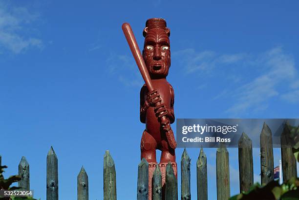 maori statue of a figure - maori art stock pictures, royalty-free photos & images