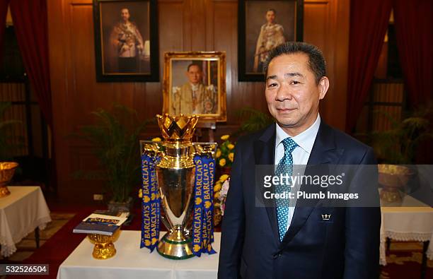 Vichai Srivaddhanaprabha, Chairman and Owner of Leicester City poses with the Premier League Trophy during a visit to the Emerald Palace on May 19,...
