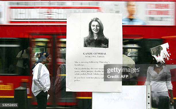 London, UNITED KINGDOM: The poster of a missing Turkish woman stares out from a bus shelter opposite King's Cross station in London, 18 July 2005....